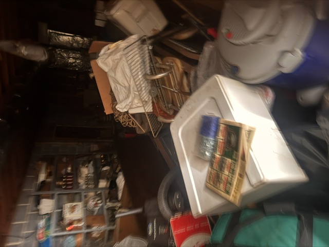 Garage clutter removal — before